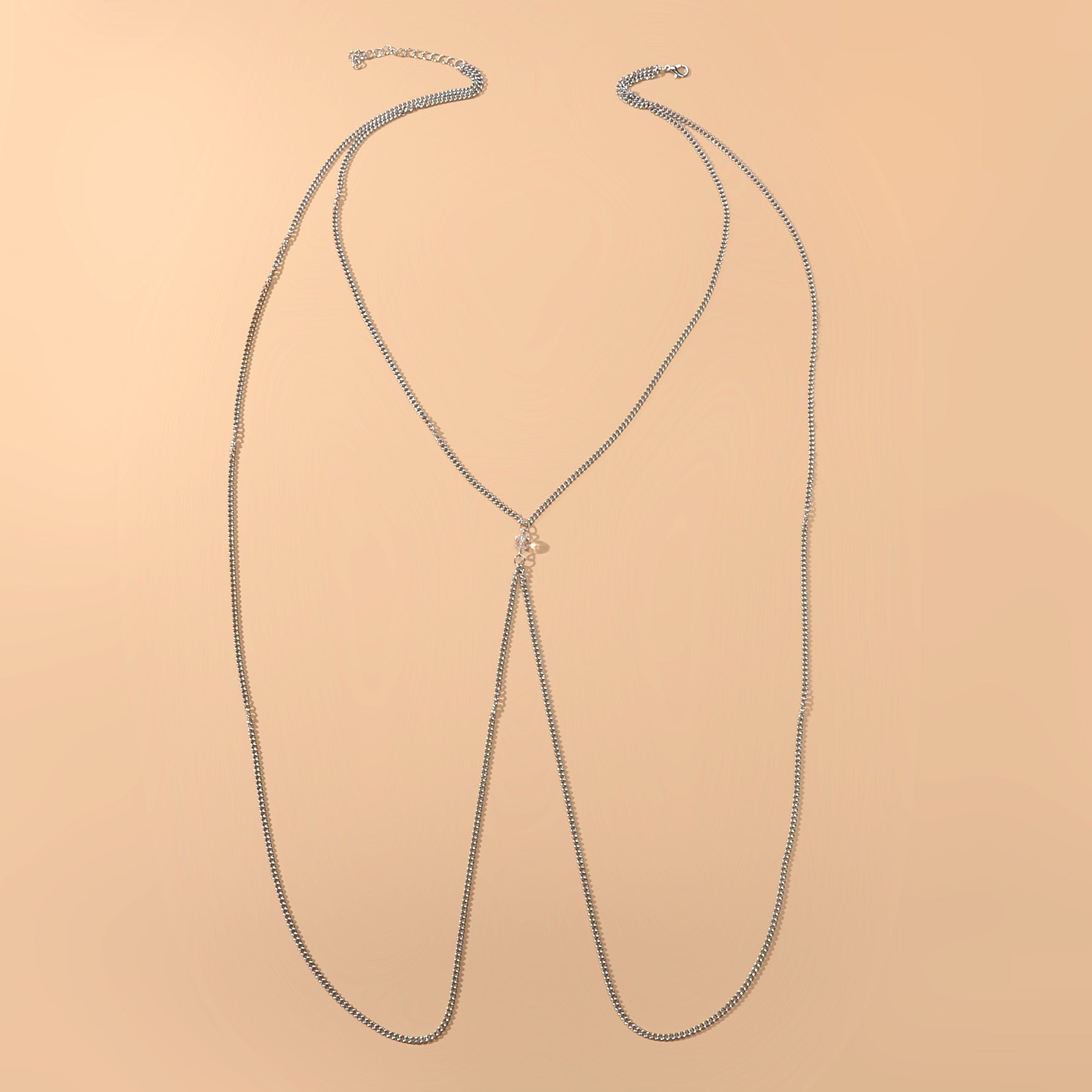 Silver-tone layered chest and belly body chain harness displayed for beach and festival fashion styling. — view 2