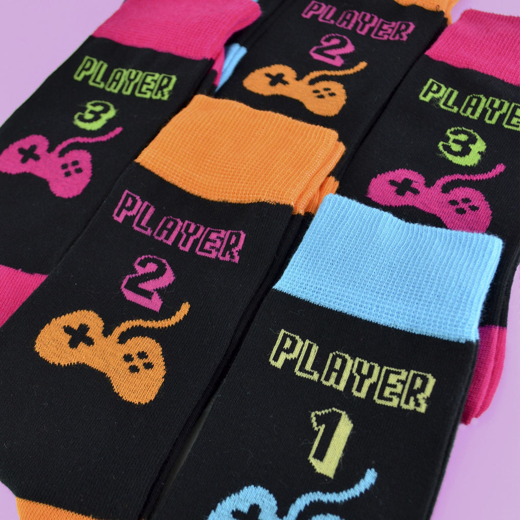 Three pack of men's retro gaming crew socks featuring colourful arcade and video game designs — view 3