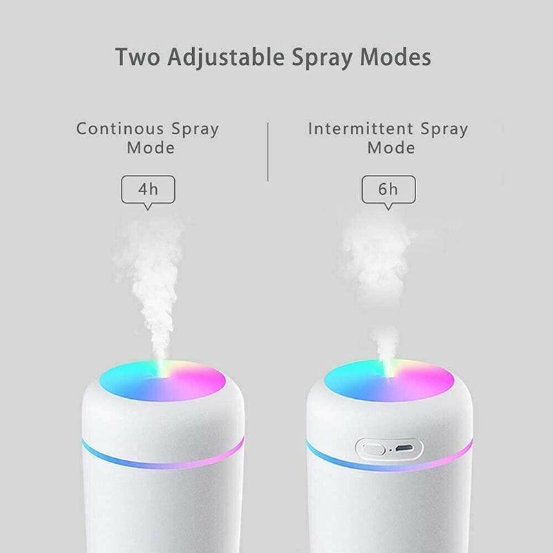 Portable USB car humidifier and essential oil diffuser emitting cool mist on a desk — view 5