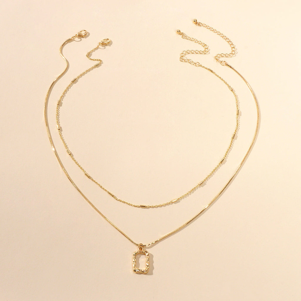 Minimalist square pendant layered necklace set with adjustable chain in metallic gold and silver finish — view 2