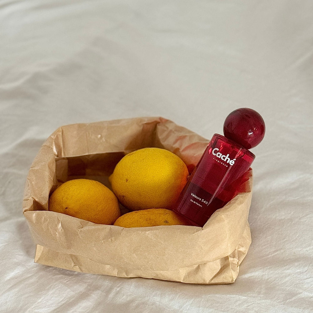 Caché Velours 540 unisex eau de parfum 50ml glass bottle with warm golden amber liquid — view 5