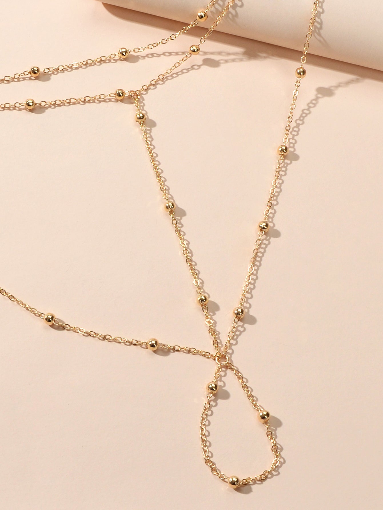 Gold chain boho layered anklet with toe ring attachment, elegant barefoot sandal foot jewellery. — view 3