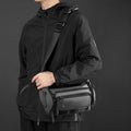 Running waist pack and hydration belt with adjustable strap and multiple zippered storage compartments.