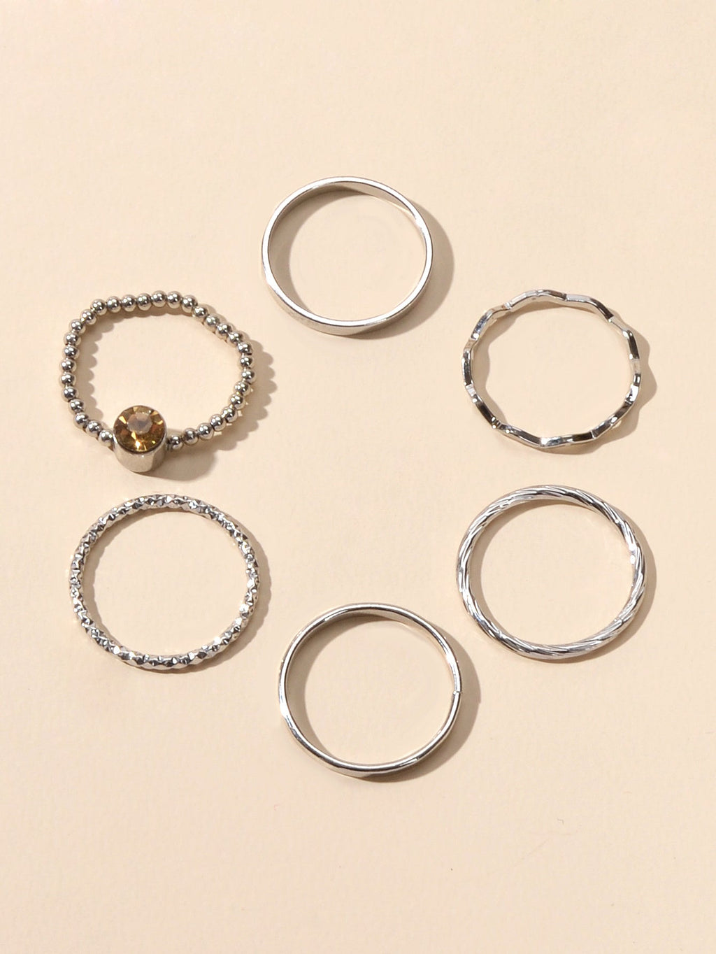Six piece stackable silver tone rhinestone ring set in assorted sizes for women