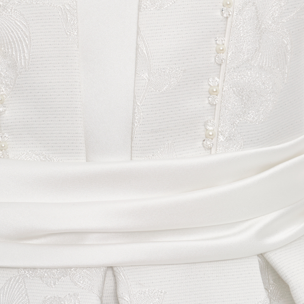 Elegant off-white girls formal dress with floral texture, flared skirt, and a matching small handbag. — view 5