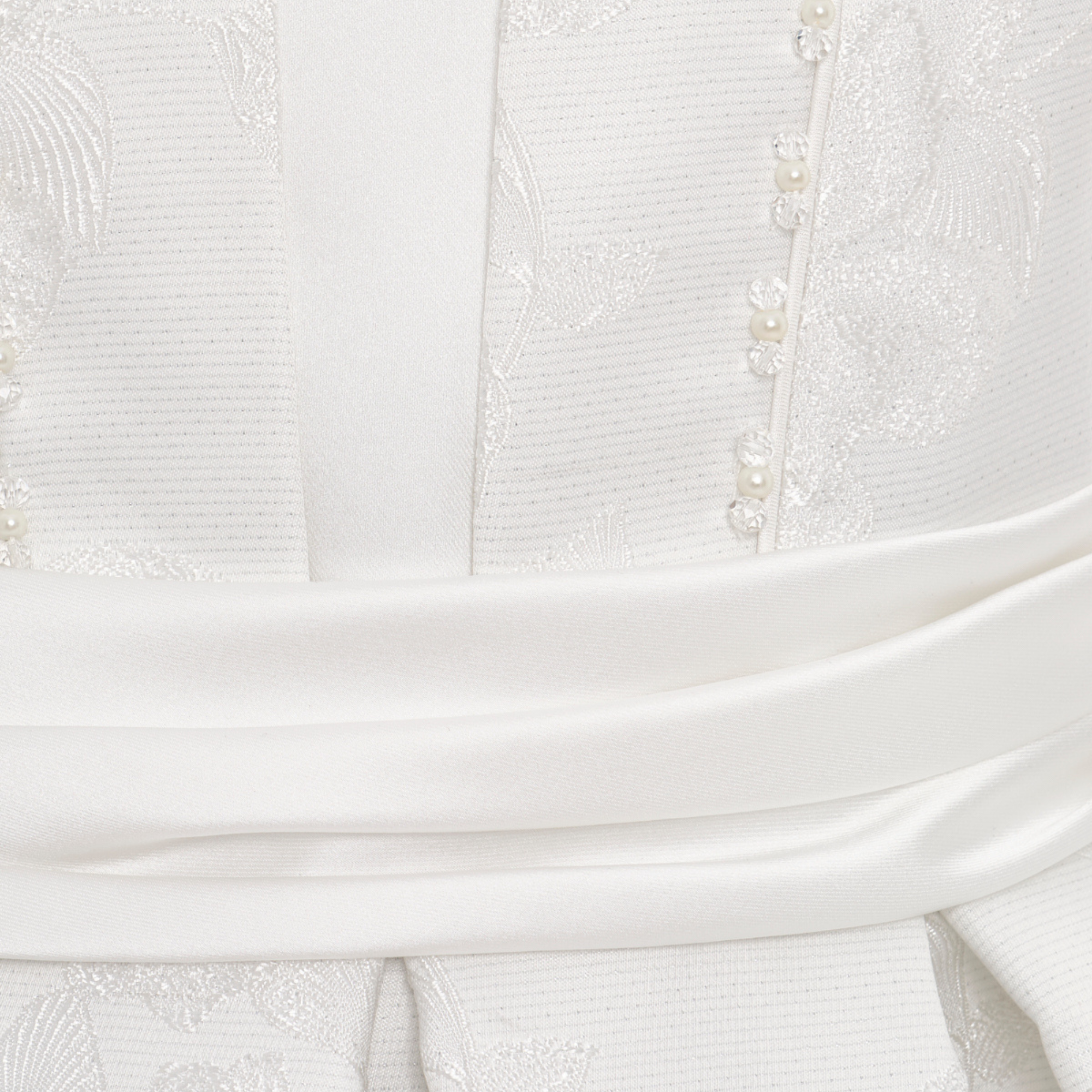 Elegant off-white girls formal dress with floral texture, flared skirt, and a matching small handbag. — view 5