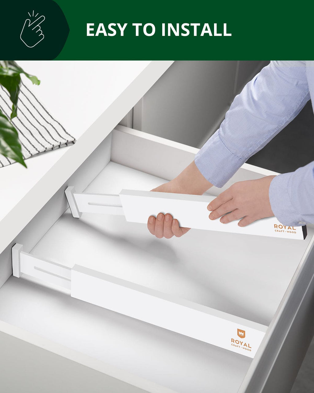 Adjustable 22 inch white bamboo drawer dividers organizing kitchen utensils in a drawer. — view 3