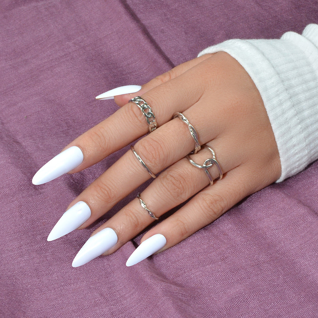 Set of five minimalist stackable midi finger rings in trendy gold and silver finishes — view 2