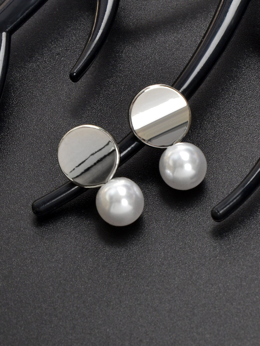 Dainty round gold metal faux pearl stud earrings for daily wear and elegant occasions. — view 5