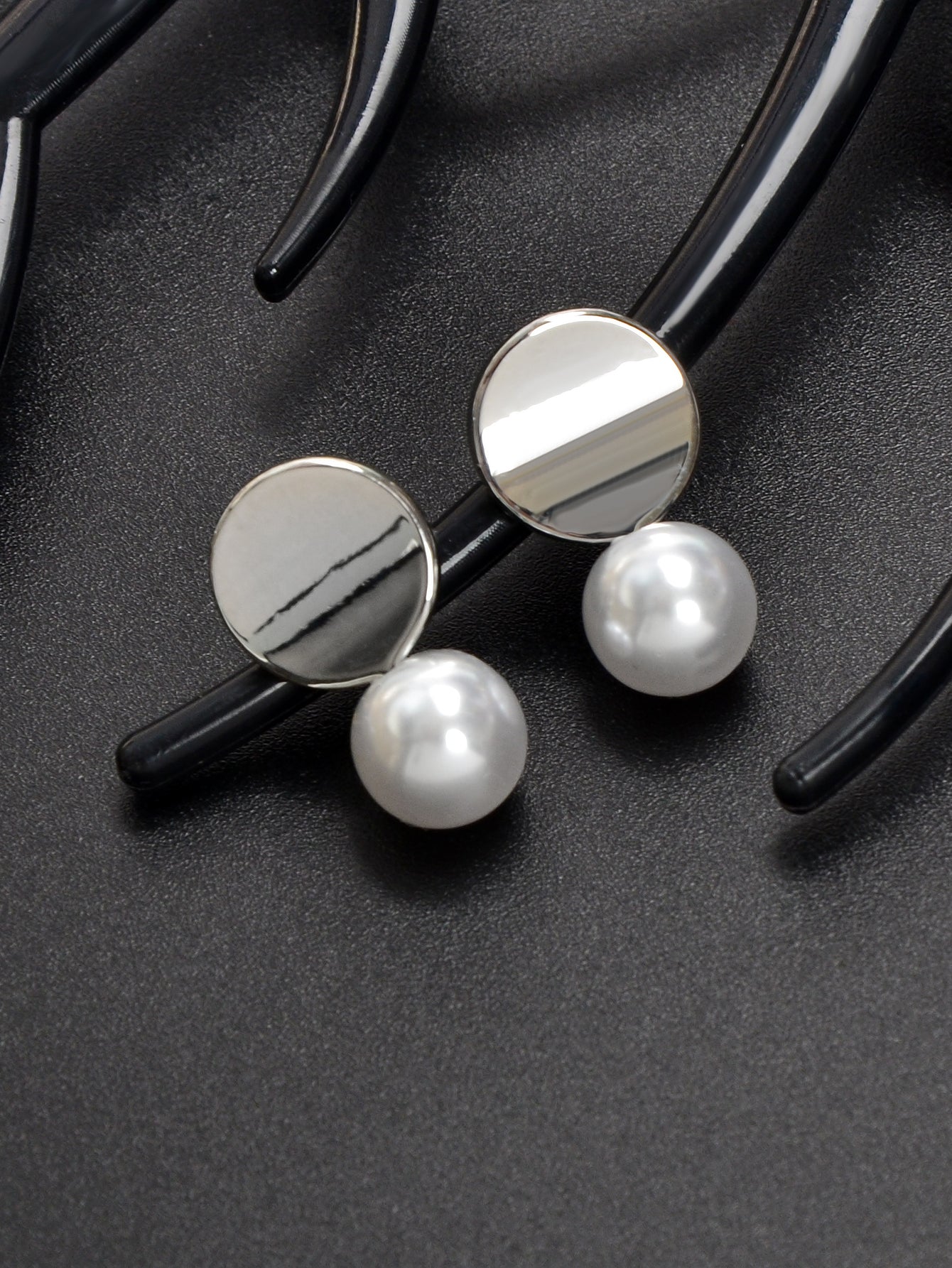 Dainty round gold metal faux pearl stud earrings for daily wear and elegant occasions. — view 5