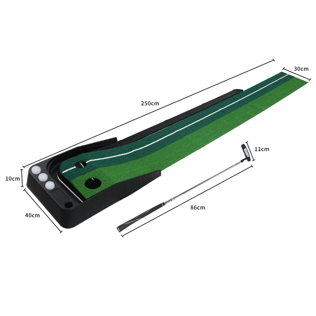 Portable green golf putting mat with ball return track, steel putter, and three white golf balls. — view 2
