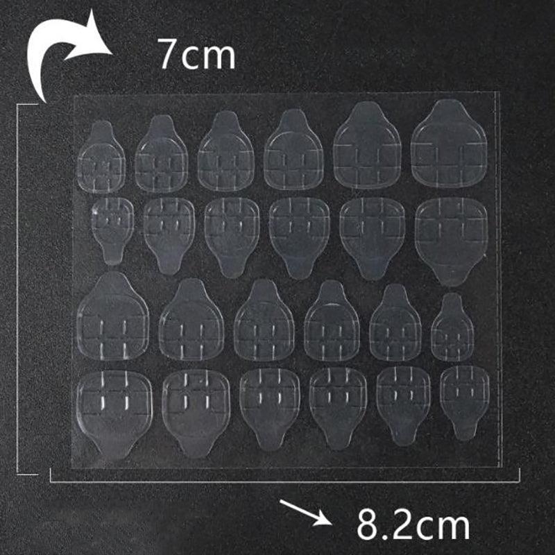 Clear double-sided adhesive press on nail stickers on a transparent plastic backing sheet. — view 5