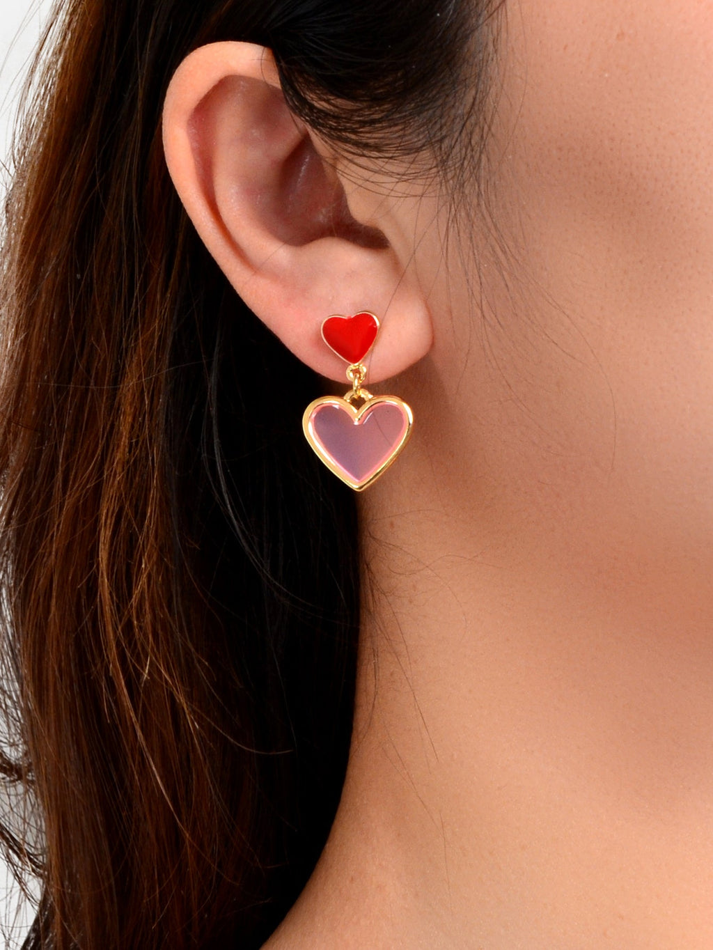 Elegant dangling love heart drop stud earrings for women on a clean background — view 2