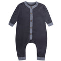 Organic cotton newborn baby romper with cable knit details, foldable cuffs, and natural coconut buttons