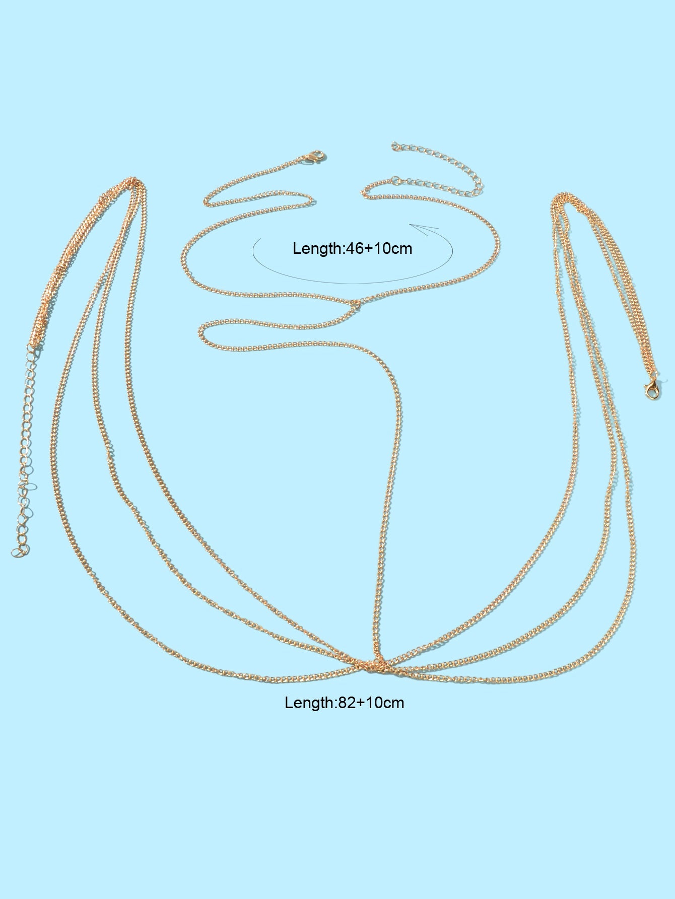 Layered gold and silver tassel body chain worn over a bikini for beach parties — view 2