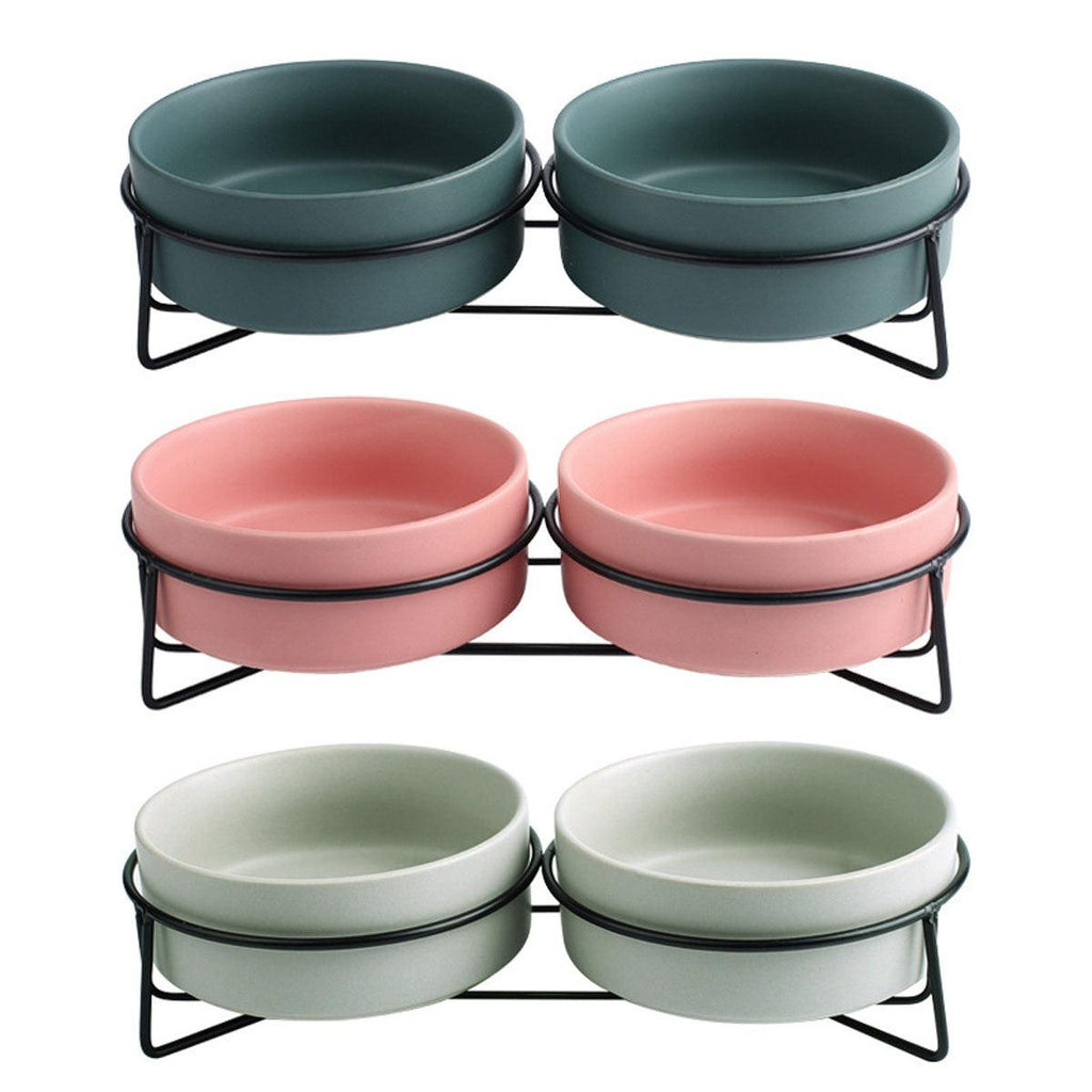 Elevated ceramic pet bowl set with two bowls resting securely on a sturdy metal stand — view 2