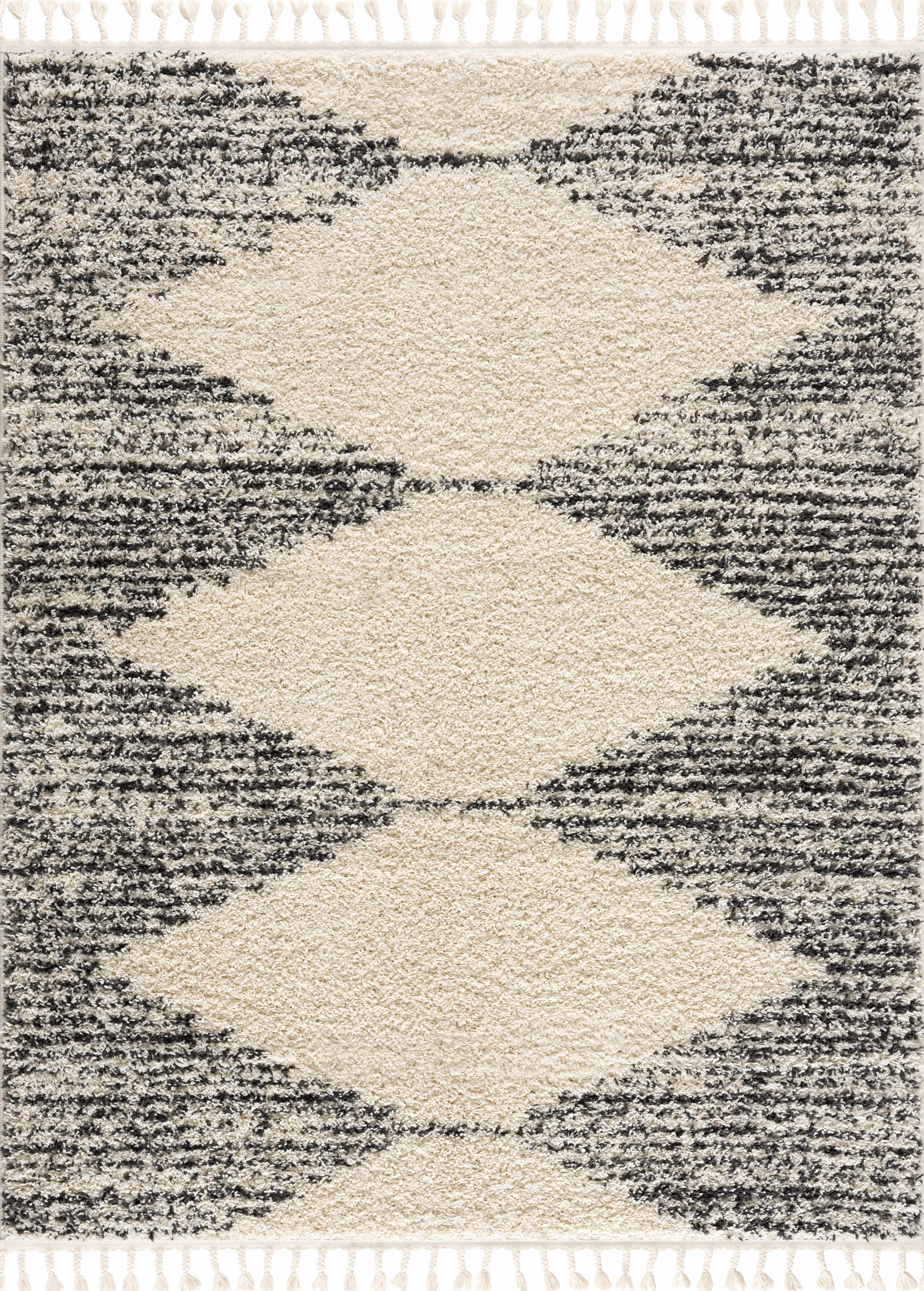 Howth plush contemporary area rug in neutral gray, beige, and brown with a geometric pattern.