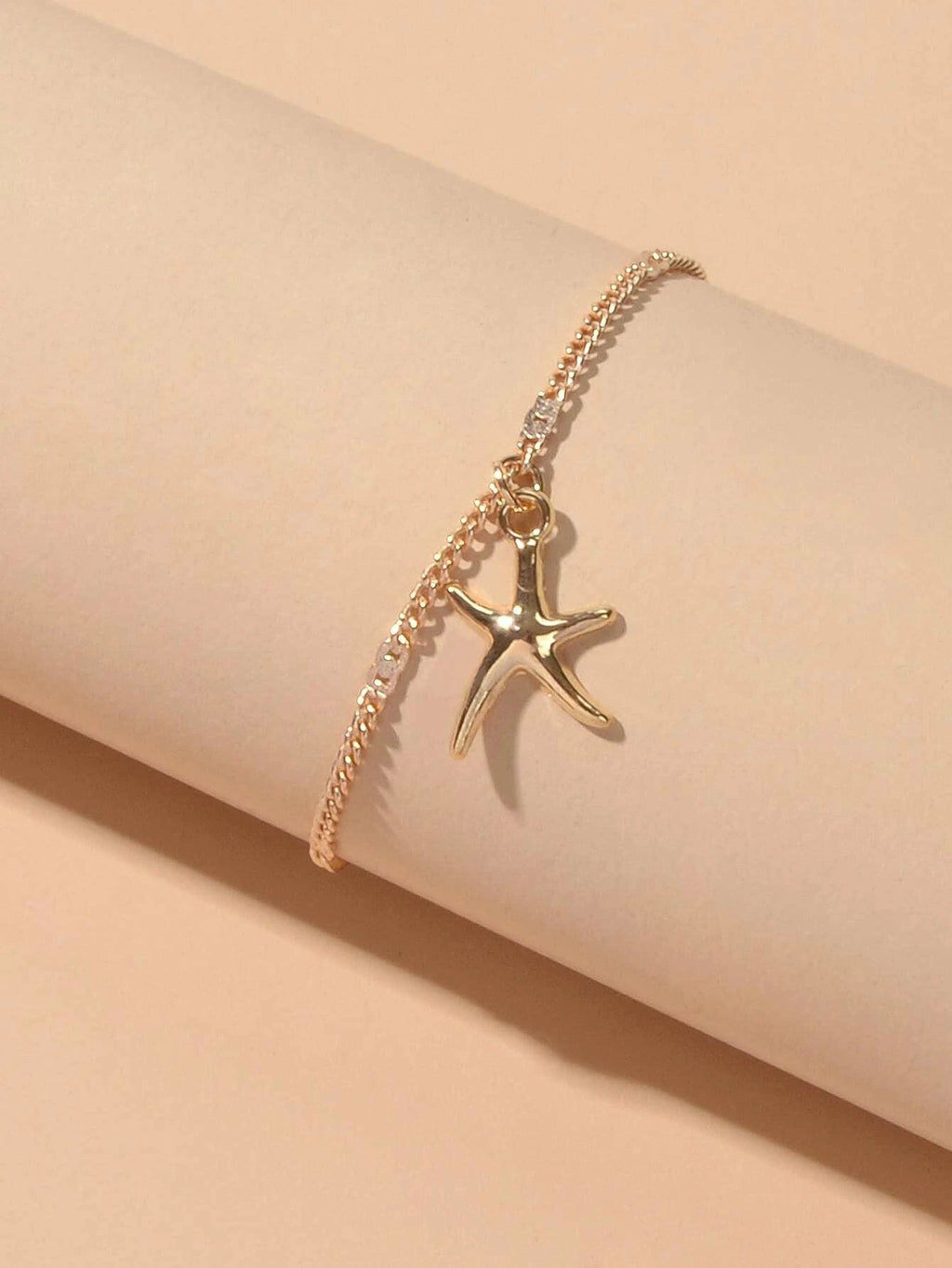 Silver and gold tone starfish charm boho anklet on a delicate adjustable foot chain — view 2