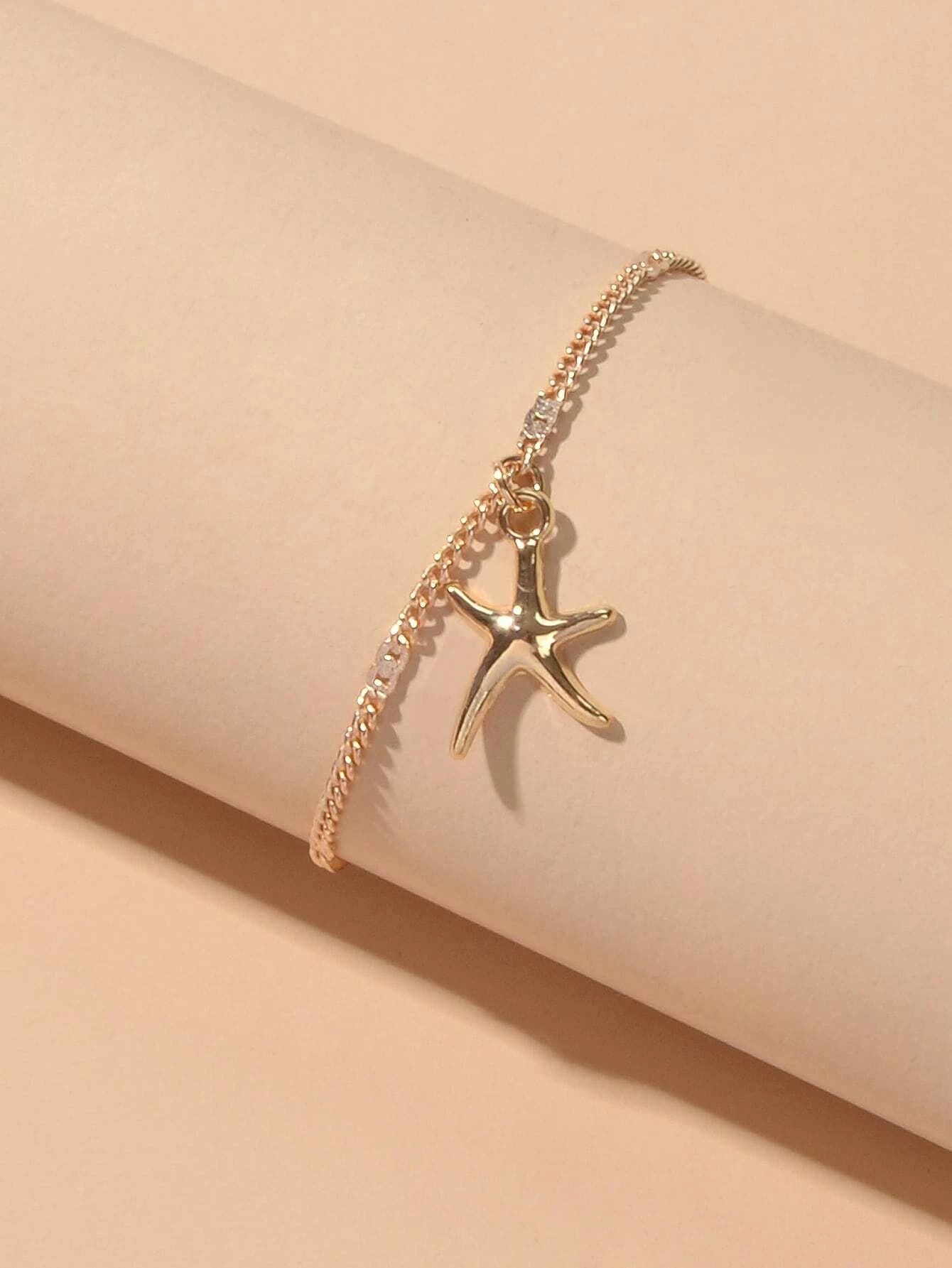 Silver and gold tone starfish charm boho anklet on a delicate adjustable foot chain — view 2