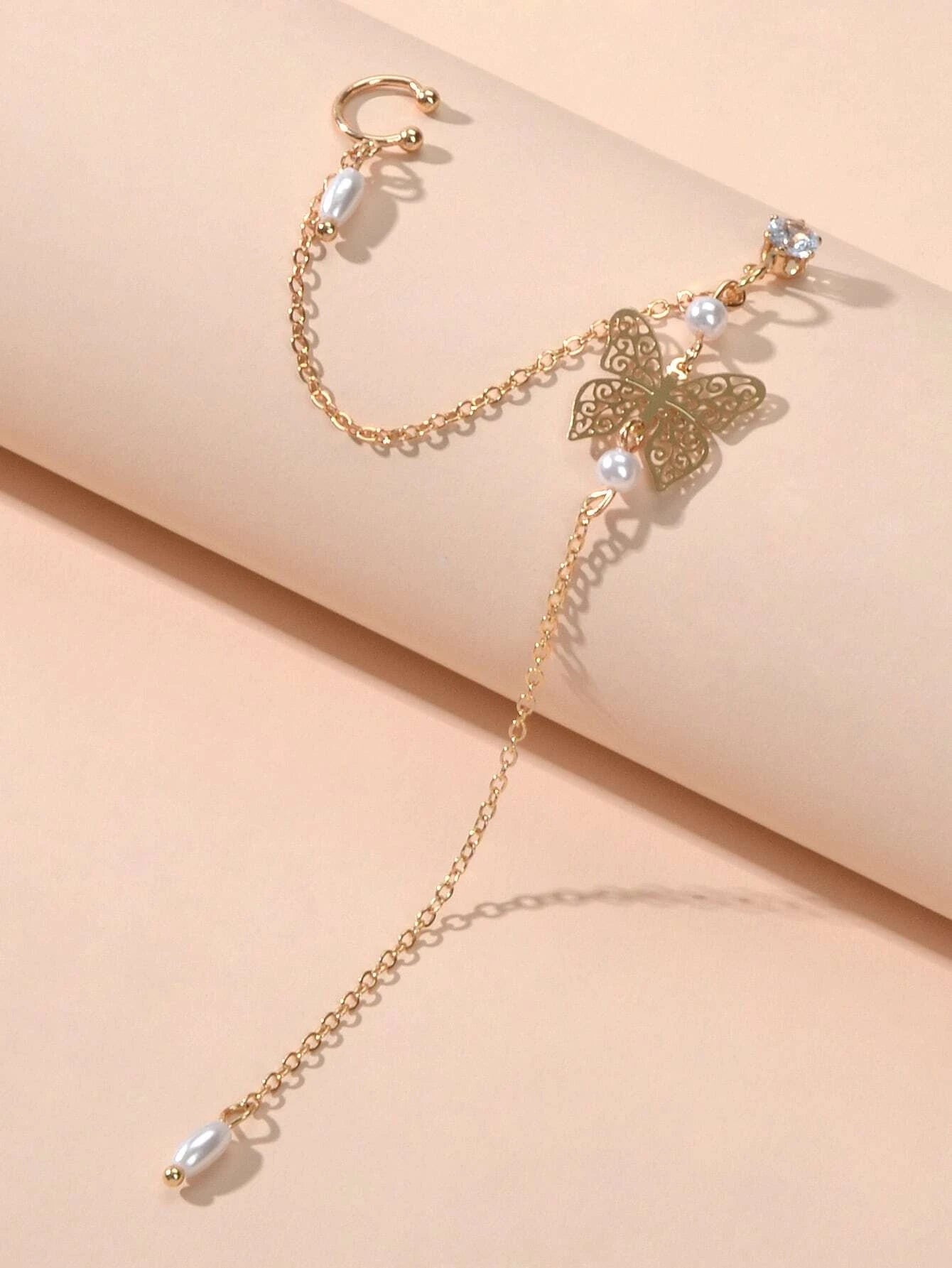 Crystal and pearl butterfly ear cuff with a long dangling chain and cartilage stud — view 2