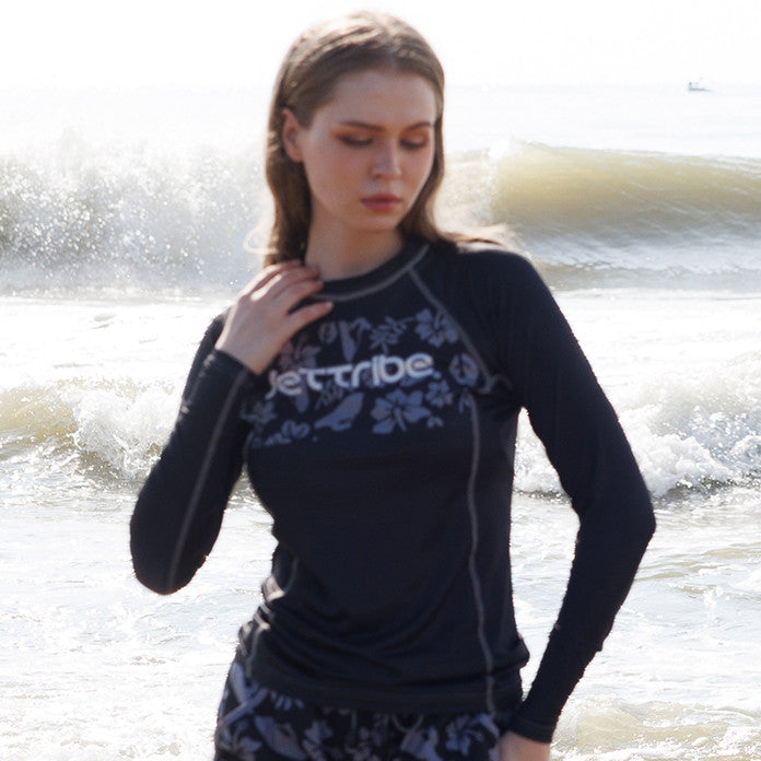 Women's black floral rashguard for water sports, featuring fade-resistant graphics and UV protection fabric — view 5