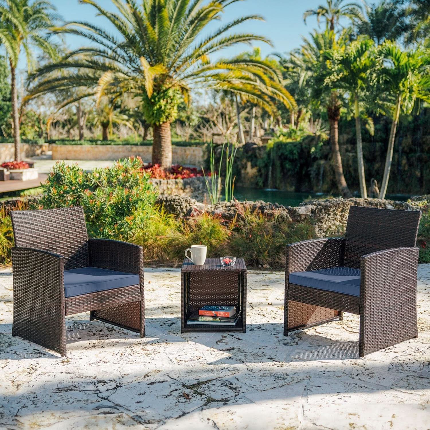 Brown and navy three-piece wicker patio bistro set with two chairs and side table — view 2