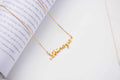 Personalized 925 sterling silver name necklace featuring an elegant script font and an adjustable delicate chain