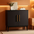 Black modern buffet cabinet with gold hardware, sturdy legs, and ample interior storage shelves