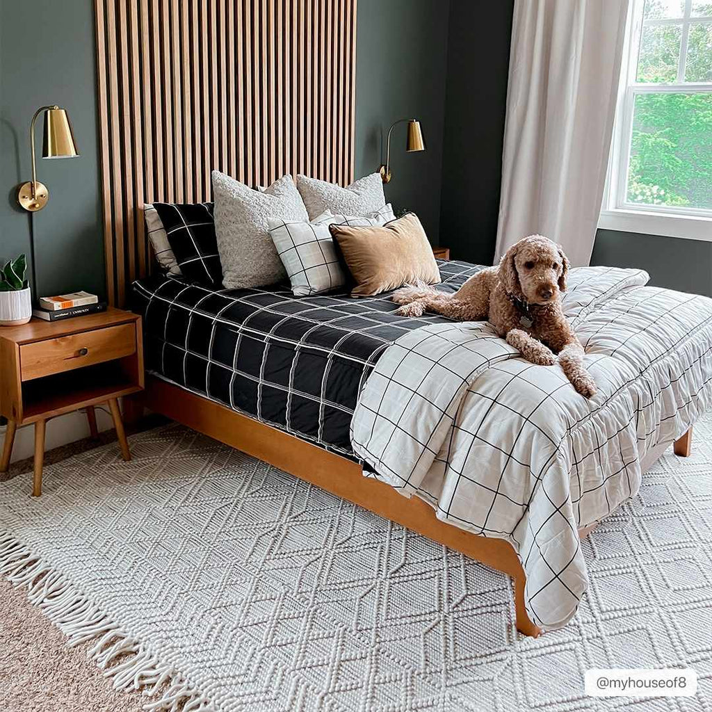 Ivory and black handwoven Ramsbury wool area rug with geometric pattern and corner tassels — view 4