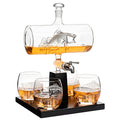 Bass fish shaped whiskey decanter set with mahogany wood stand, spigot, and four etched glasses.