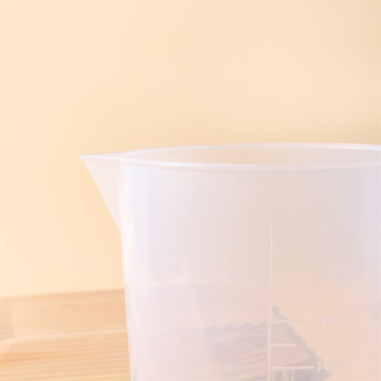 Large 2000ml clear measuring cup with graduation marks and pouring spout for baking and crafting — view 4