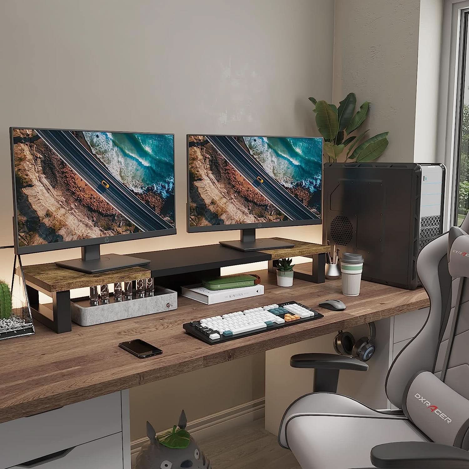 Wood and steel dual monitor stand riser displaying two computer screens on an organized desk — view 5
