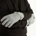 Men's ribbed 100% cashmere winter gloves featuring side vents and elegant self-piping details