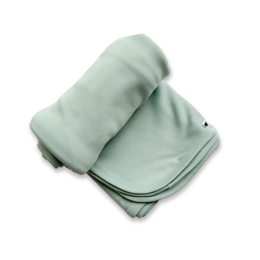 Baby bamboo swaddle blanket in tidal blue folded neatly for nursery or baby shower gift — view 4