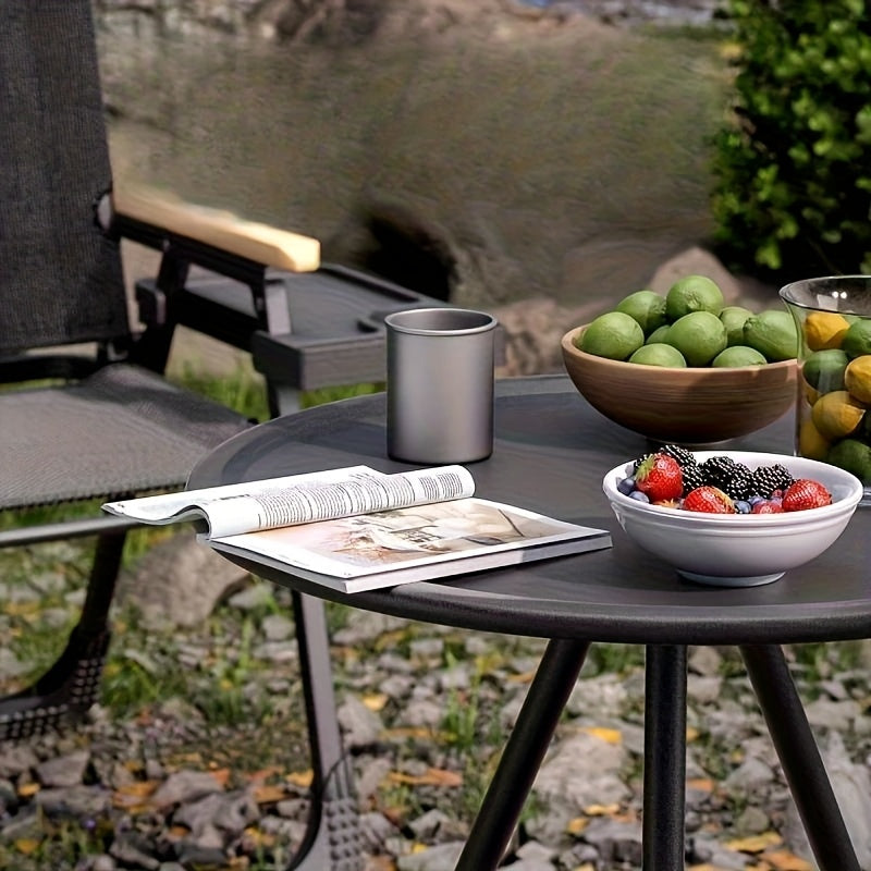 Portable round camping table with tripod base and fabric storage bag for outdoor adventures. — view 4