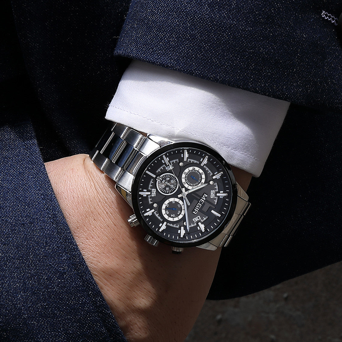 Men's Megir luxury chronograph watch with a polished stainless steel band and classic multi-dial face — view 3