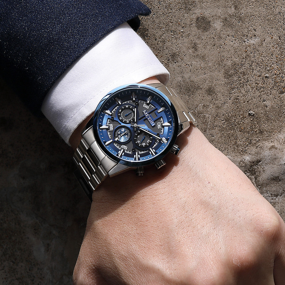 Men's Megir luxury chronograph watch with a polished stainless steel band and classic multi-dial face — view 2