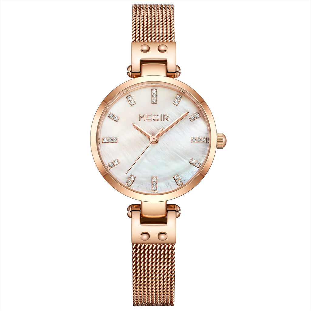 Women's quartz wristwatch featuring a round brass case and elegant metallic mesh steel band. — view 13