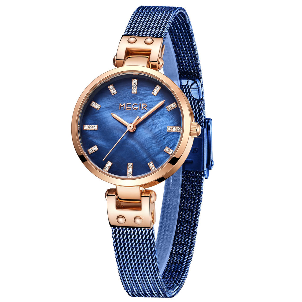 Women's quartz wristwatch featuring a round brass case and elegant metallic mesh steel band. — view 16