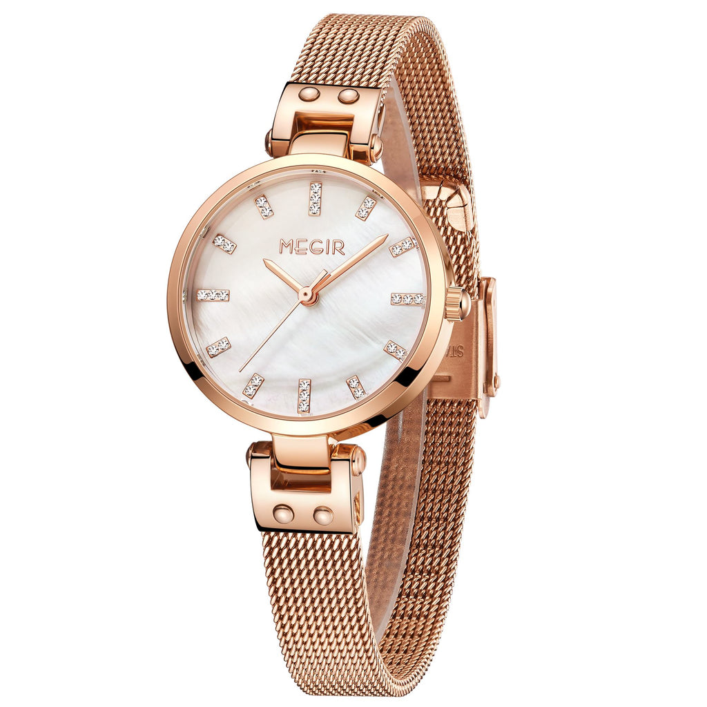 Women's quartz wristwatch featuring a round brass case and elegant metallic mesh steel band. — view 14