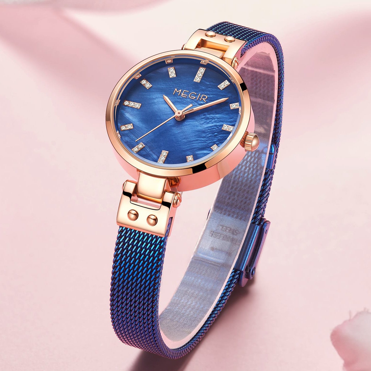 Women's quartz wristwatch featuring a round brass case and elegant metallic mesh steel band. — view 10