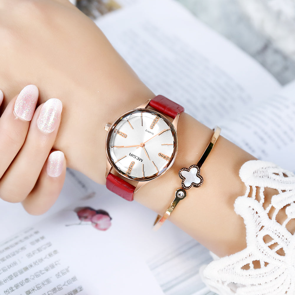 Elegant luxury women's wristwatch with a polished brass case, diamond-accented dial, and premium leather strap. — view 2