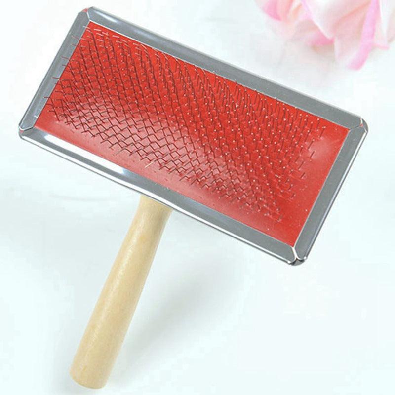 The Furbuster Pro dog grooming comb with wooden handle and stainless steel needle pins — view 4
