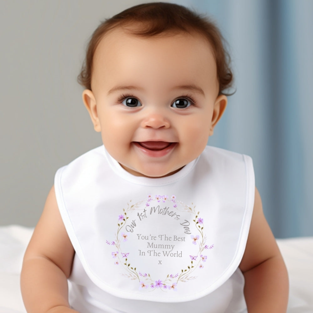White baby grow, vest, and bib featuring a colorful floral first Mother's Day printed design — view 2