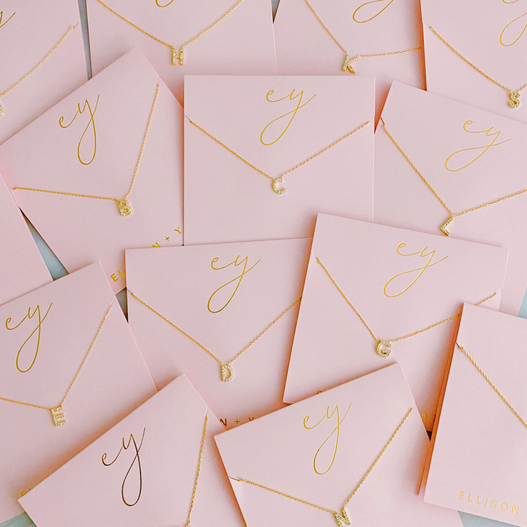 18k gold plated initial necklace with cubic zirconia stones on a delicate chain — view 3