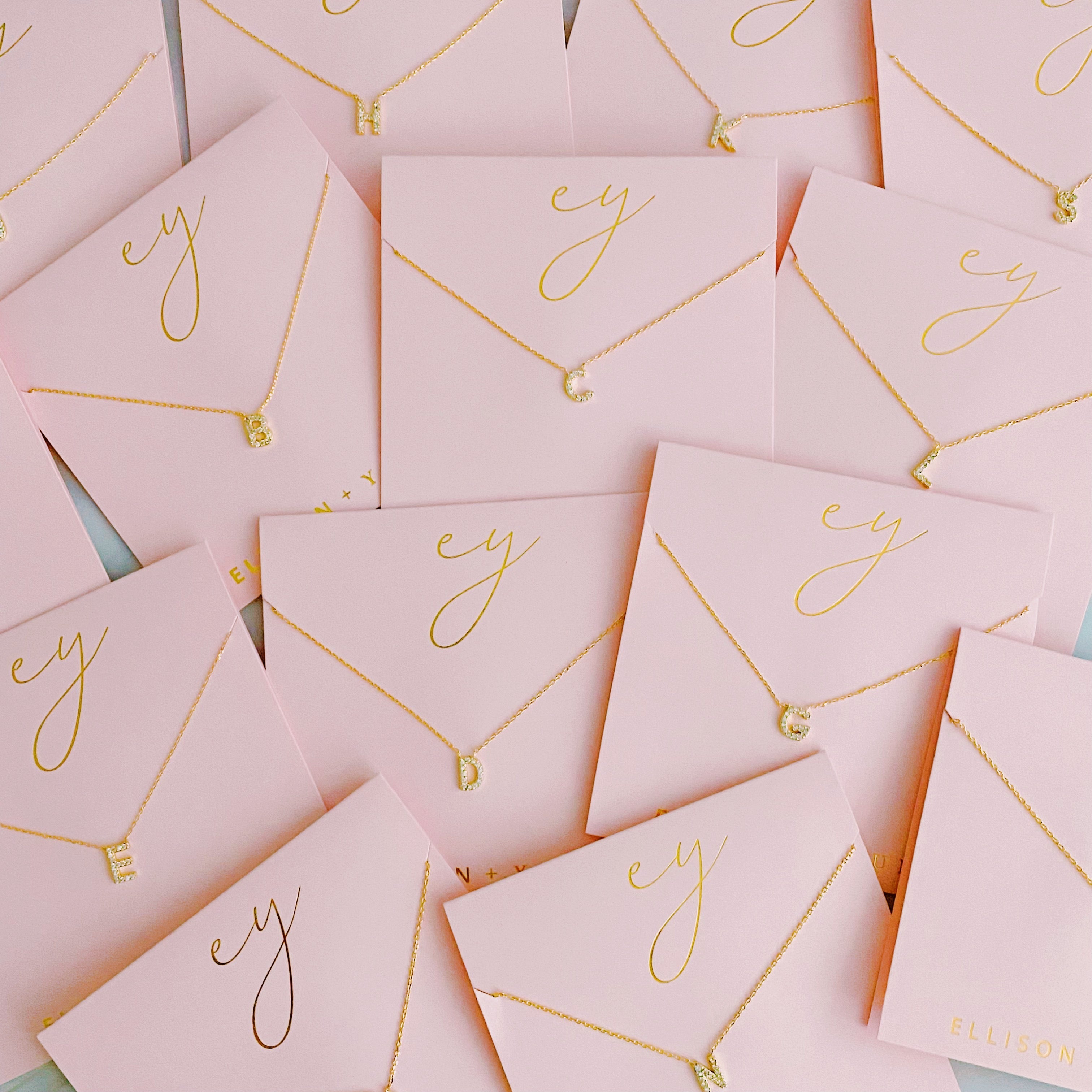 18k gold plated initial necklace with cubic zirconia stones on a delicate chain — view 3