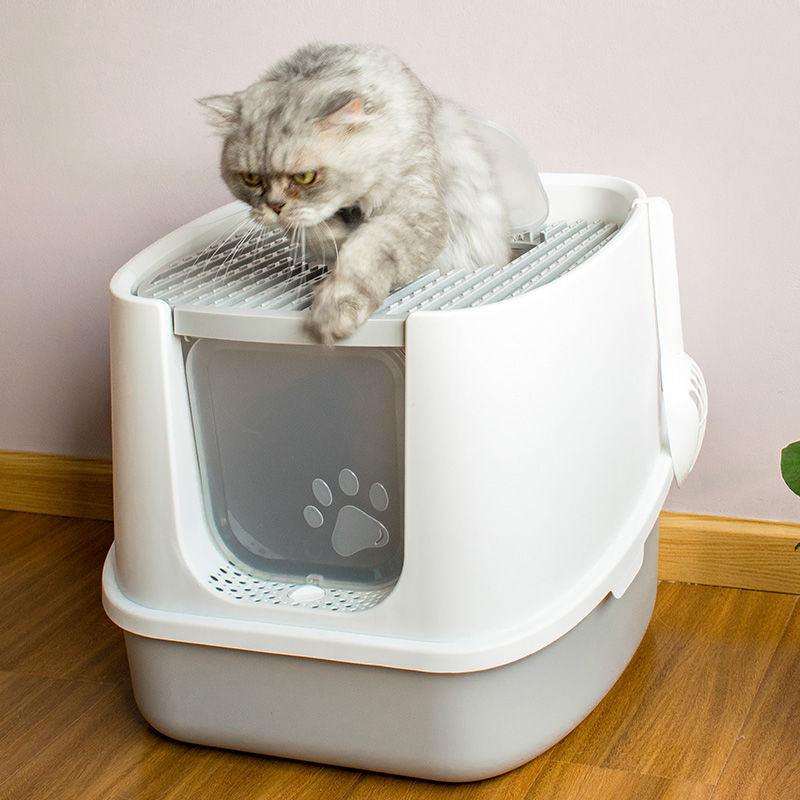 Enclosed anti-splash cat litter box in modern minimalist plastic design with high walls