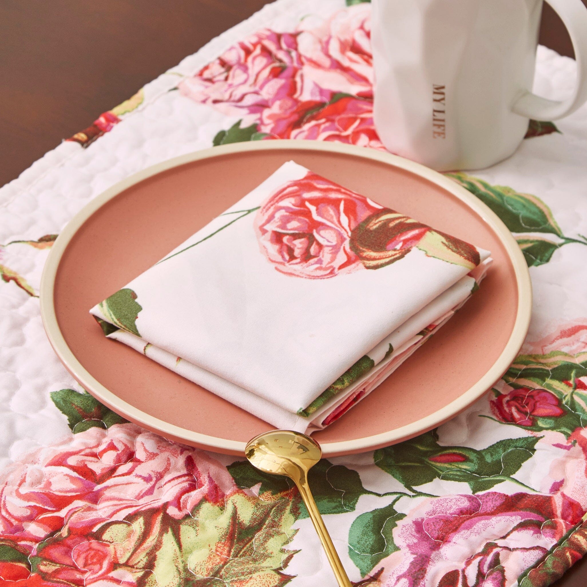 Set of four polyester romantic roses dinner napkins featuring vibrant pink floral pattern — view 2
