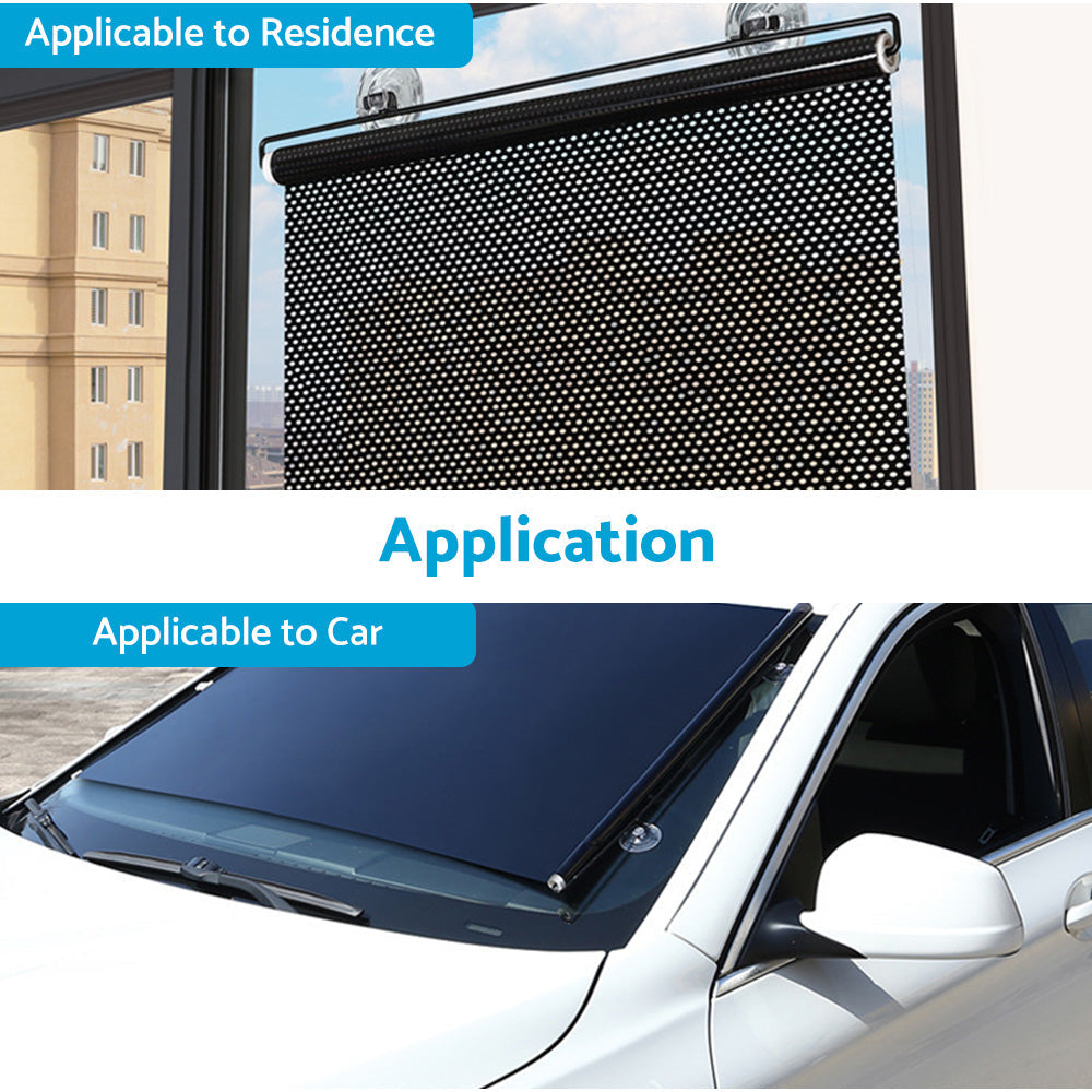 Black PVC retractable front windshield sun shade visor with suction cups mounted in car interior — view 4