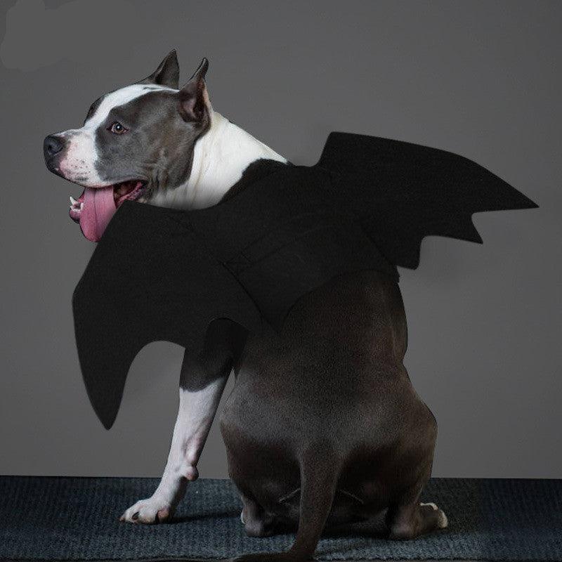 Black felt bat wings dog costume featuring adjustable Velcro straps on a white background — view 4
